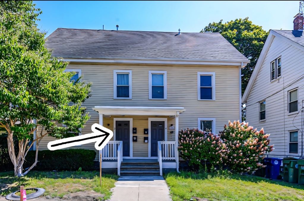 a front view of a house with a porch