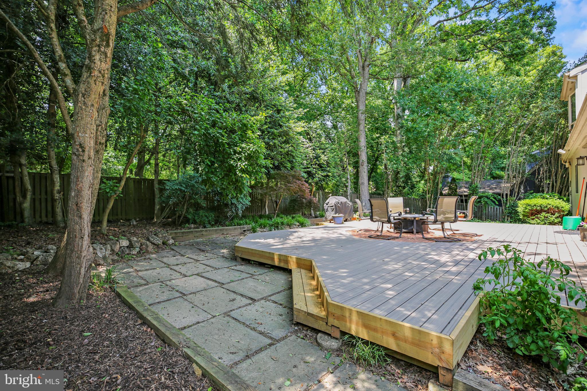 11212 Angus Place Potomac, MD 20854 - Photo 14 of 42 a view of a backyard with sitting area