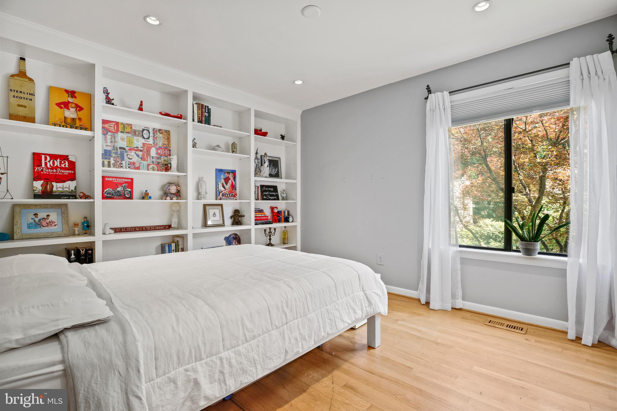 11212 Angus Place Potomac, MD 20854 - Photo 22 of 42 a bedroom with a bed and a window