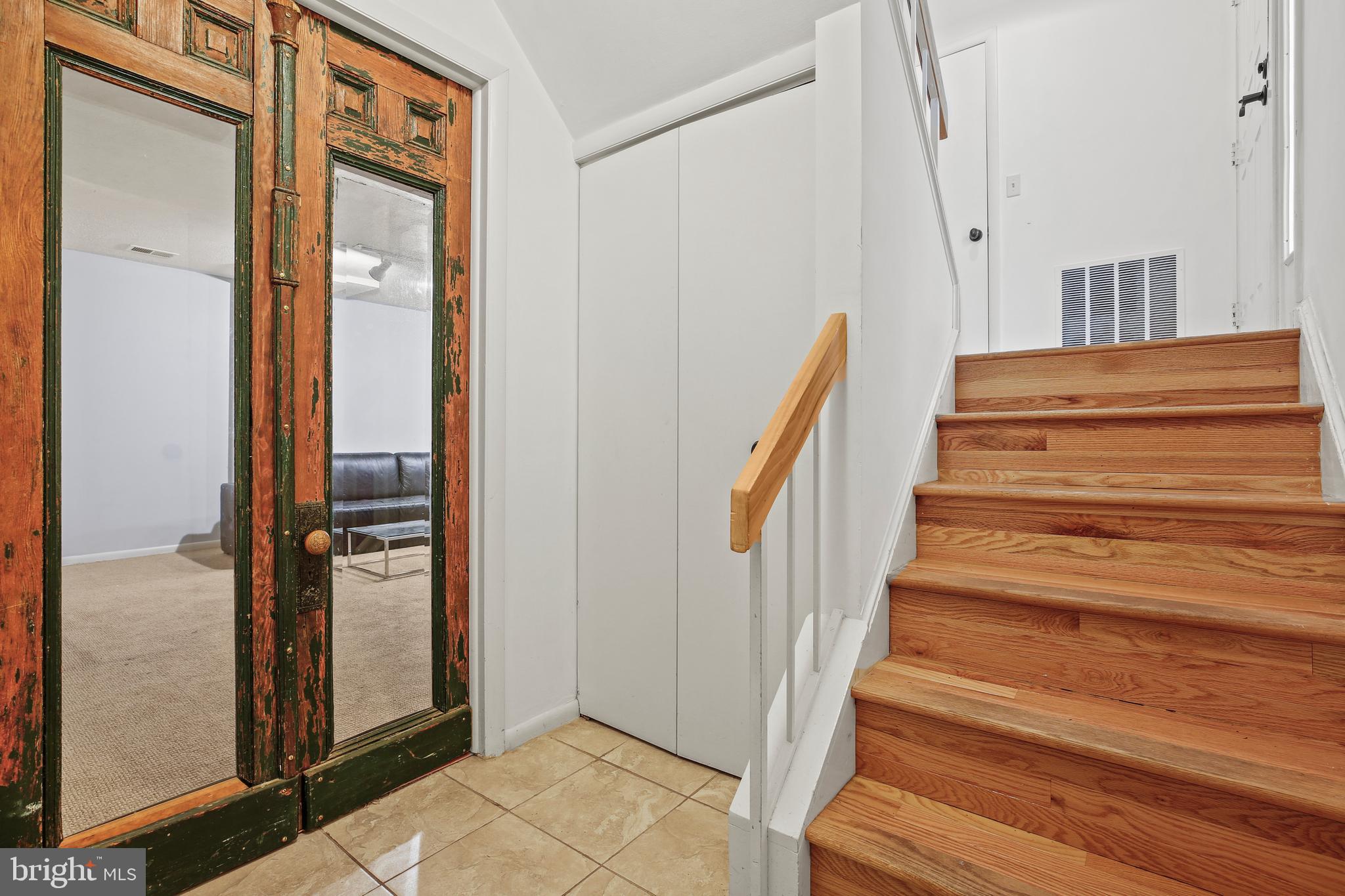 11212 Angus Place Potomac, MD 20854 - Photo 34 of 42 a view of entryway with wooden floor