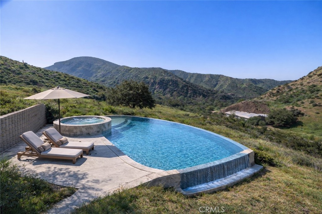 28741 Williams Canyon Road Silverado, CA 92676 - Photo 12 of 35 a view of a swimming pool with a yard