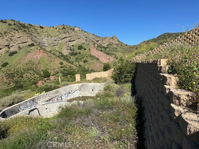 28741 Williams Canyon Road Silverado, CA 92676 - Photo 13 of 35 a view of a large building with mountains in the background