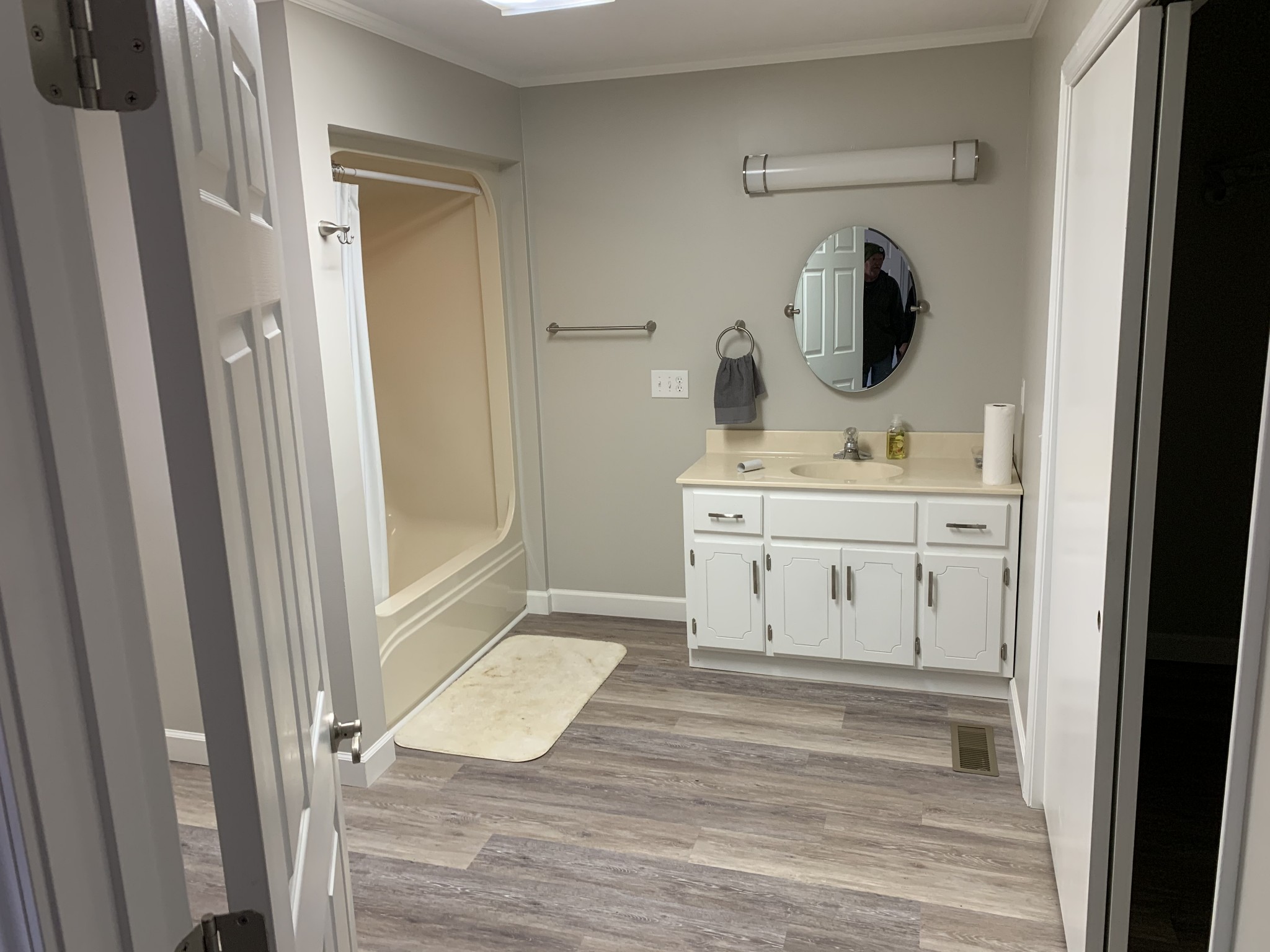 881 Russom Road Finger, TN 38334 - Photo 17 of 61 a bathroom with a sink and a mirror