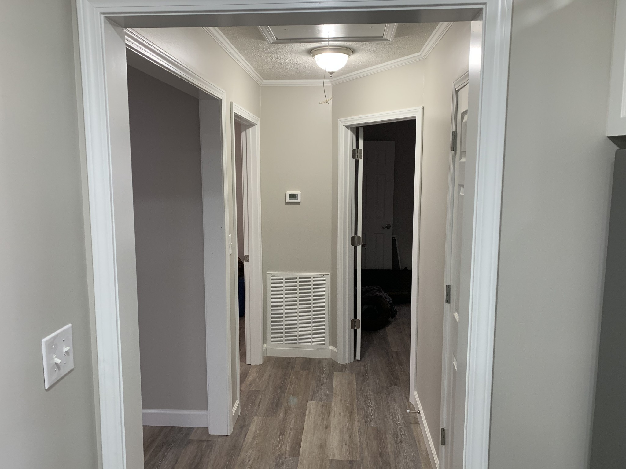 881 Russom Road Finger, TN 38334 - Photo 24 of 61 a view of a hallway with wooden shelves