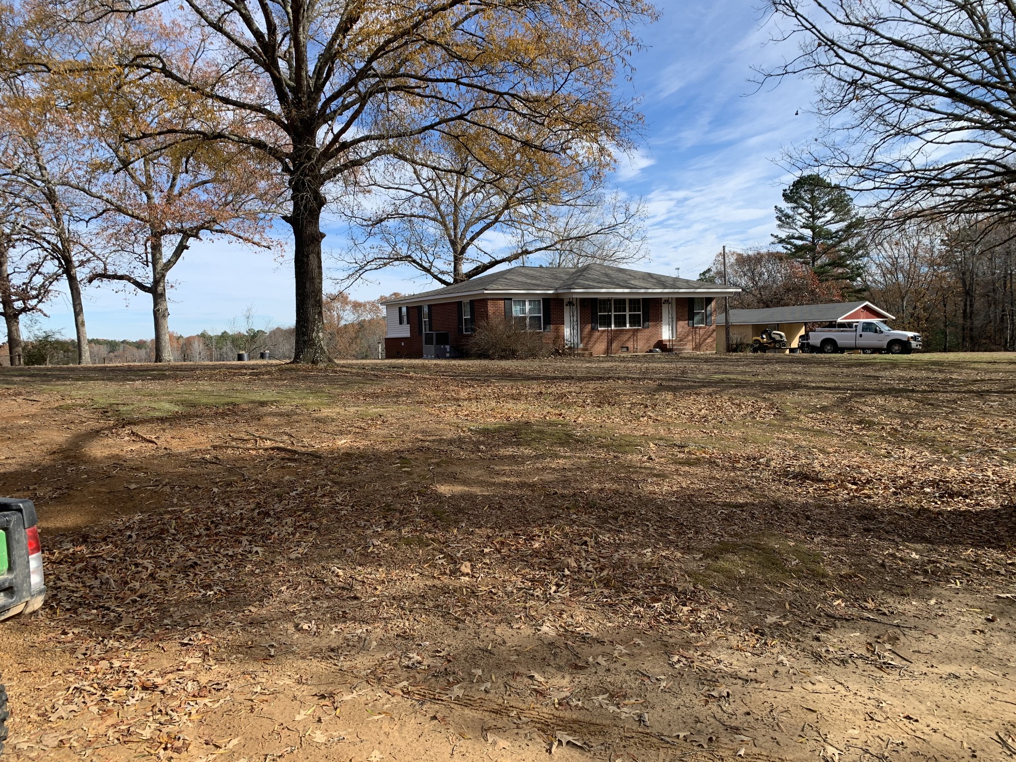 881 Russom Road Finger, TN 38334 - Photo 50 of 61 a front view of a house with a yard