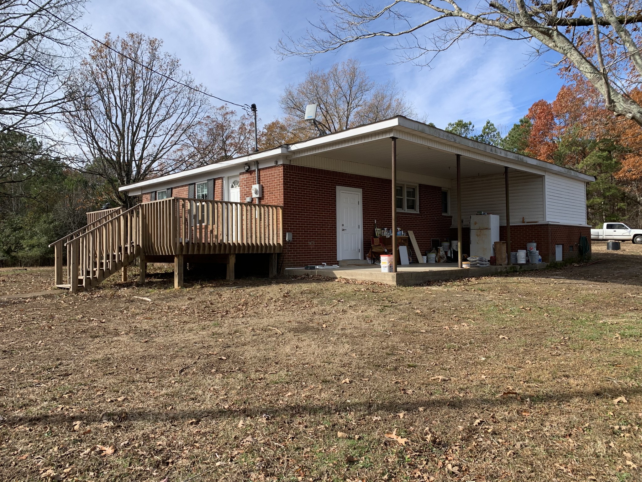881 Russom Road Finger, TN 38334 - Photo 5 of 61 a view of a house with a yard and large tree