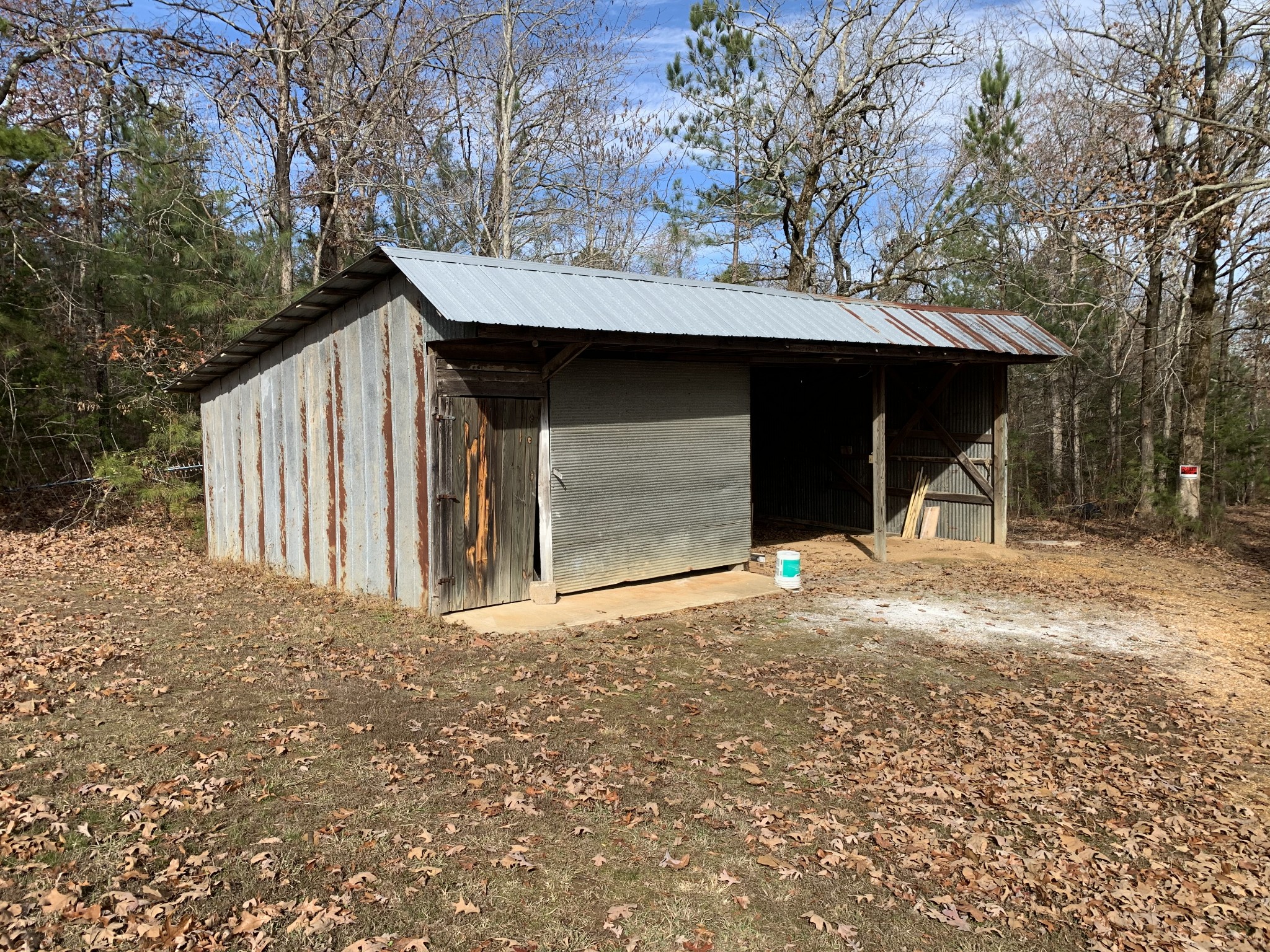 881 Russom Road Finger, TN 38334 - Photo 60 of 61 a front view of a house with a yard and garage