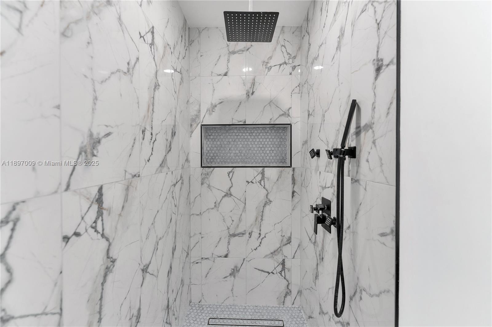 32020 Southwest 199th Avenue Homestead, FL 33030 - Photo 23 of 43 a bathroom with a shower