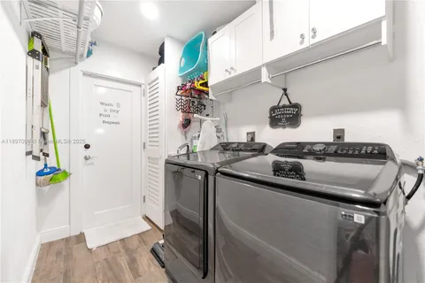 a kitchen that has a sink and a stove