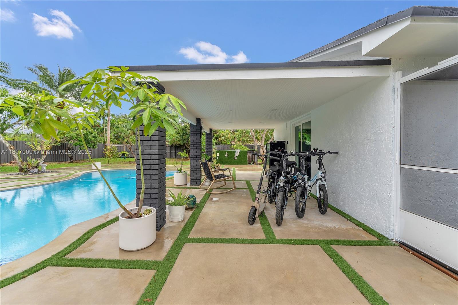 32020 Southwest 199th Avenue Homestead, FL 33030 - Photo 32 of 43 a living room with furniture
