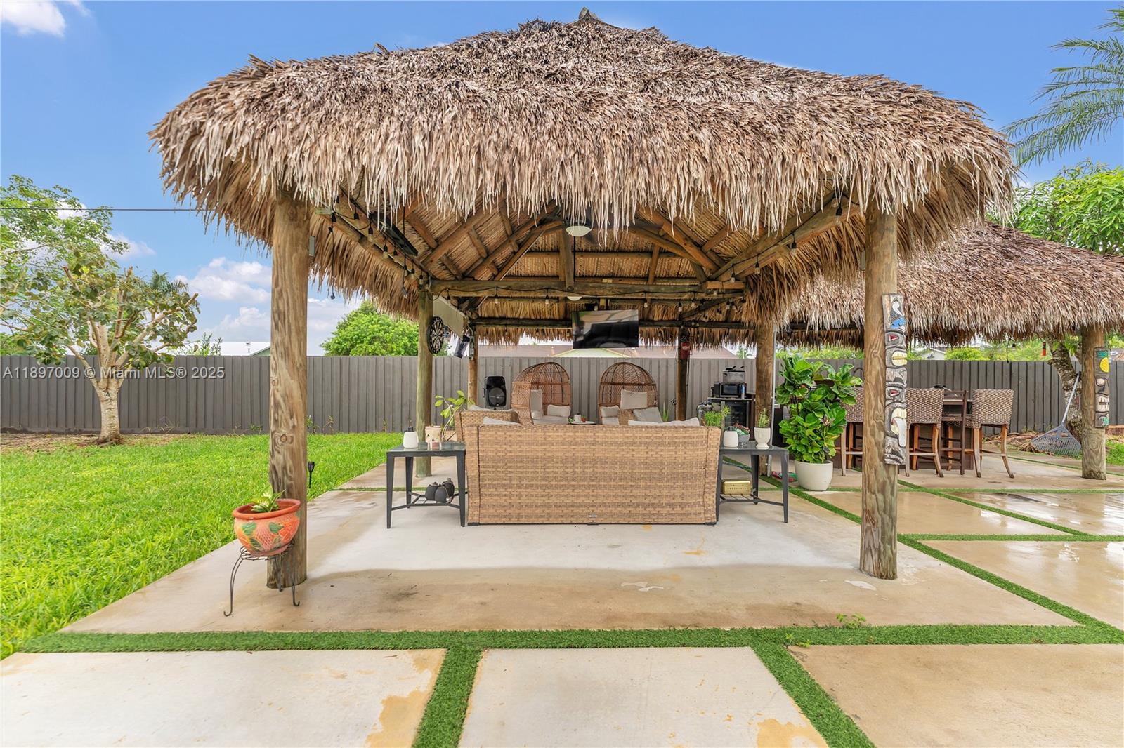 32020 Southwest 199th Avenue Homestead, FL 33030 - Photo 34 of 43 a view of outdoor space deck and tree
