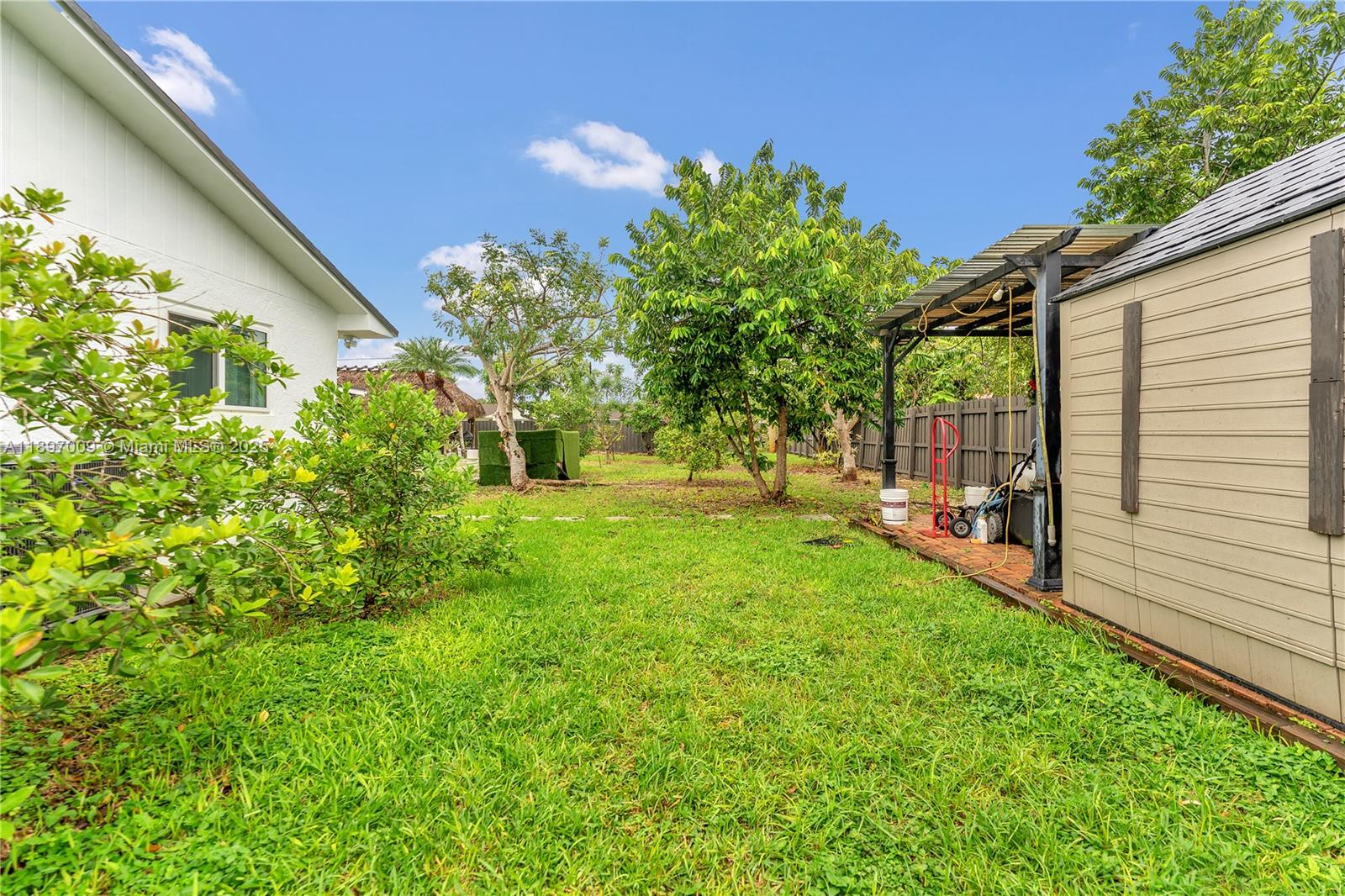 32020 Southwest 199th Avenue Homestead, FL 33030 - Photo 40 of 43 a view of yard with green space