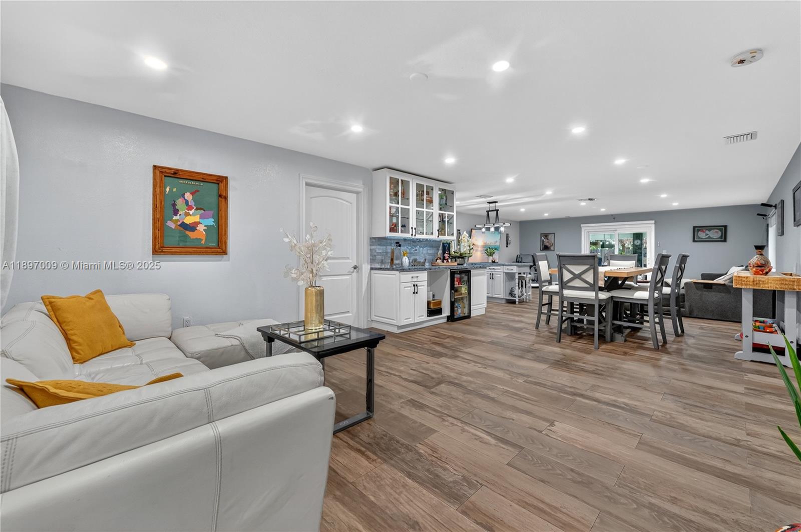 32020 Southwest 199th Avenue Homestead, FL 33030 - Photo 5 of 43 a living room with furniture and a wooden floor