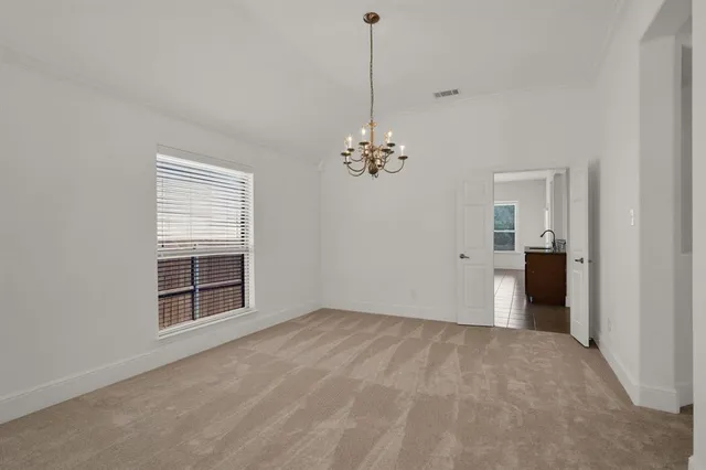 a view of a room with a en suite bathroom