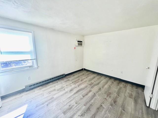 612 Union Street California, PA 15419 - Photo 9 of 9 an empty room with wooden floor and windows