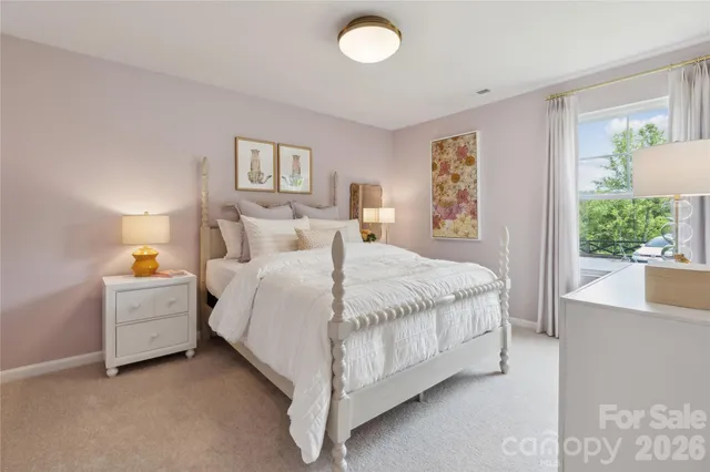 a bed room with bed and a window