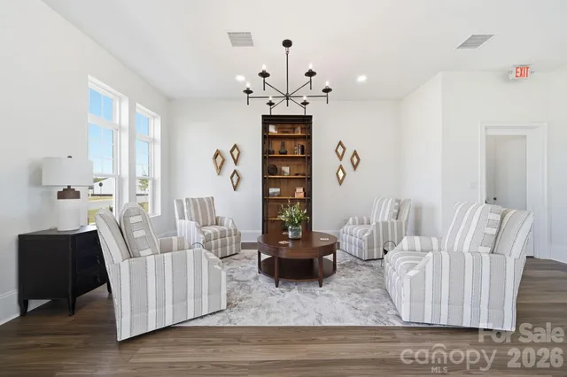 a view of swimming pool and brick wall