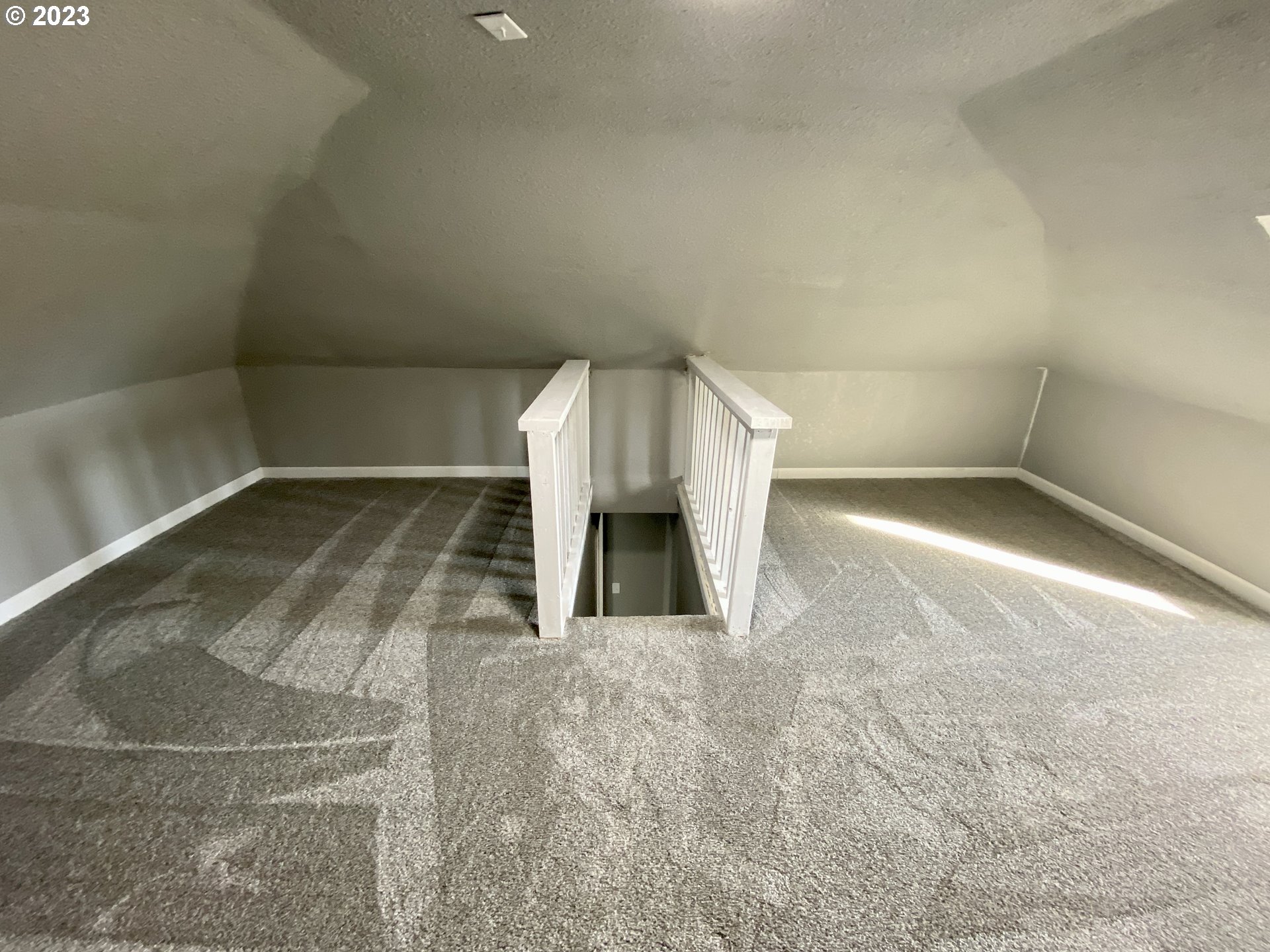 417 East Court Street Goldendale, WA 98620 - Photo 16 of 19 a view of a livingroom with a staircase