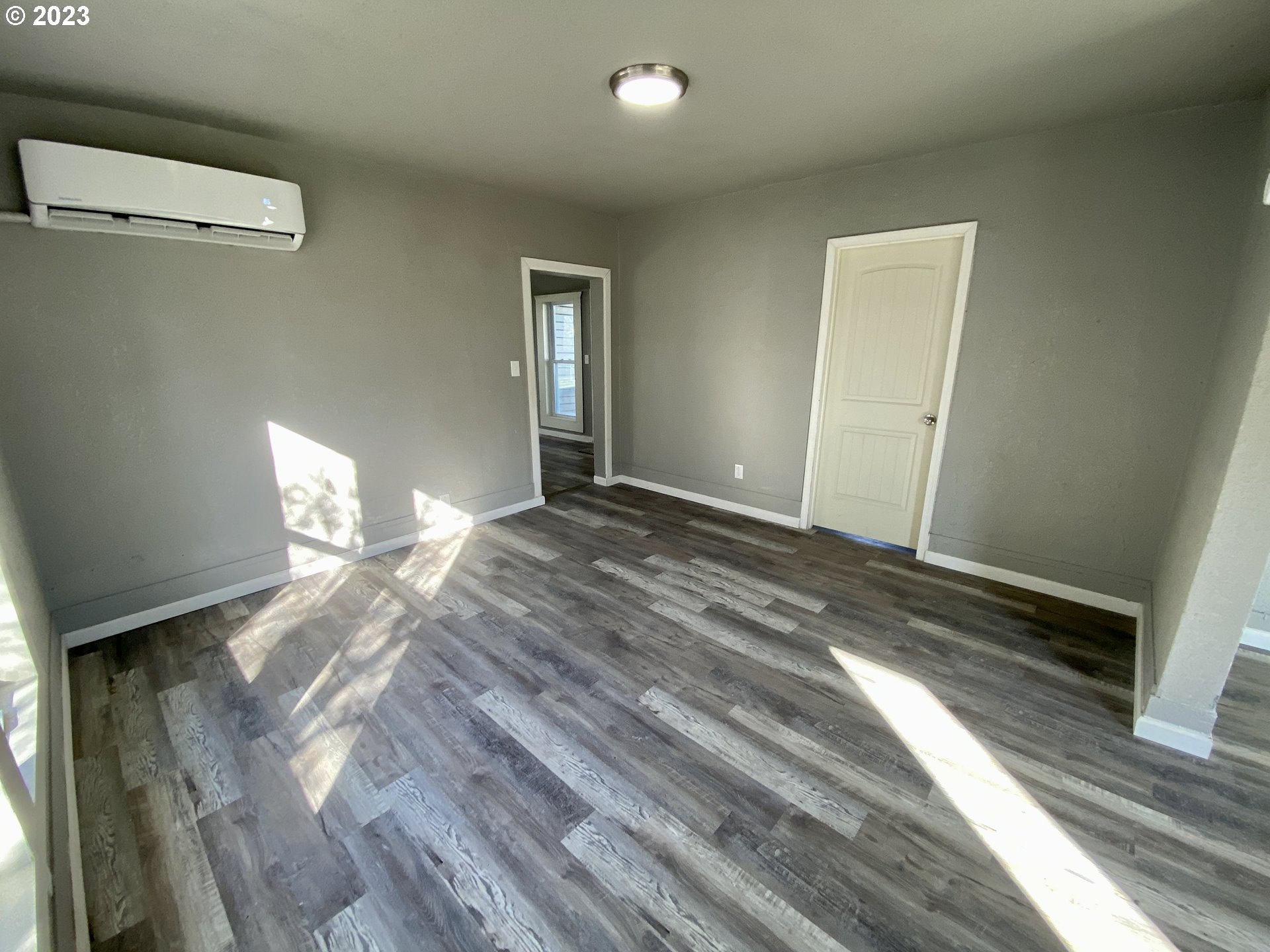 417 East Court Street Goldendale, WA 98620 - Photo 5 of 19 a view of empty room with wooden floor