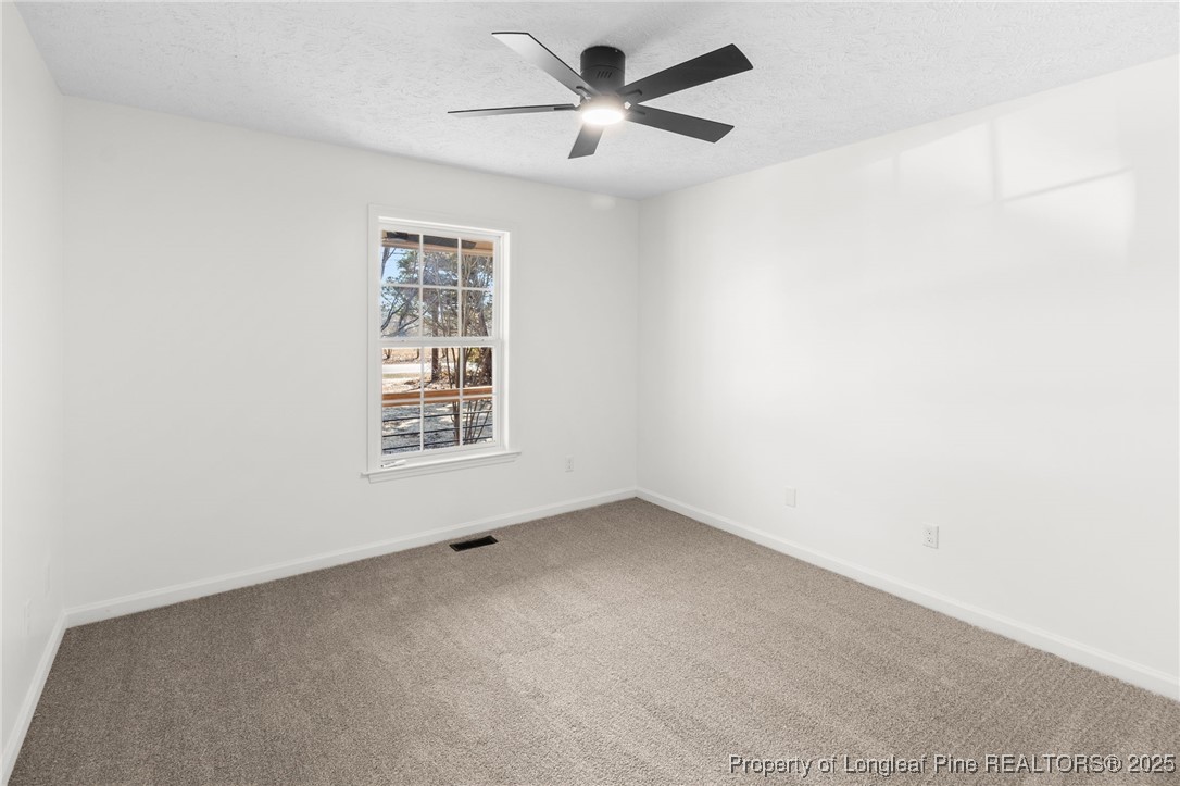 3638 Golfview Road Hope Mills, NC 28348 - Photo 21 of 35 a view of an empty room with a window