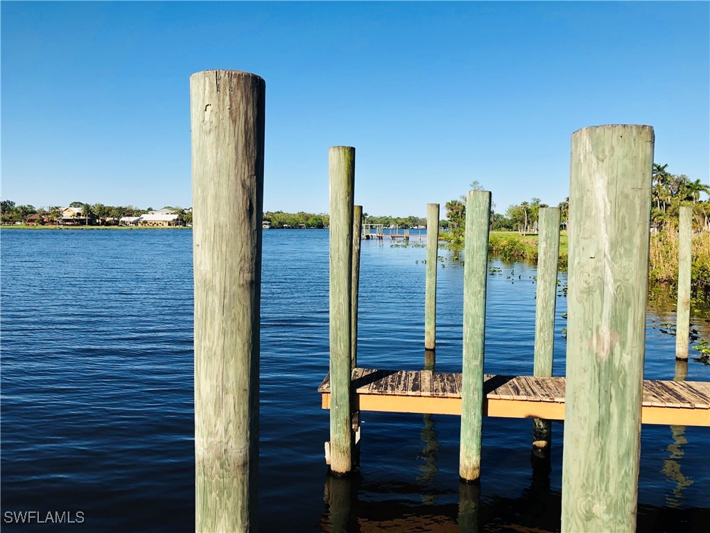 17720 Taylor Road Alva, FL 33920 - Photo 4 of 10 a view of a building with floor to ceiling windows