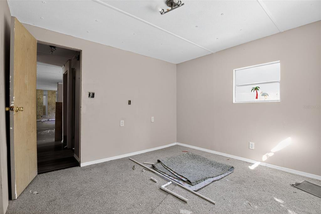 3140 Northeast 162 Place Citra, FL 32113 - Photo 14 of 30 a room with a table