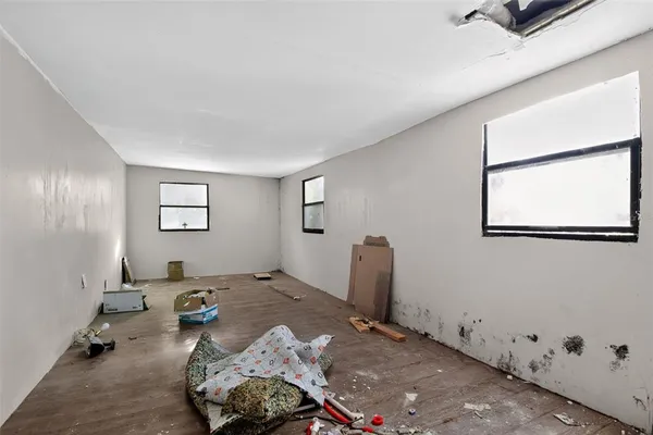 a view of small space with wooden floor