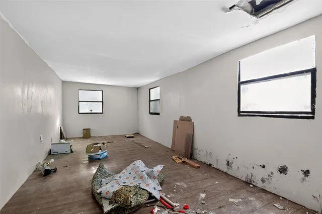 a view of small space with wooden floor