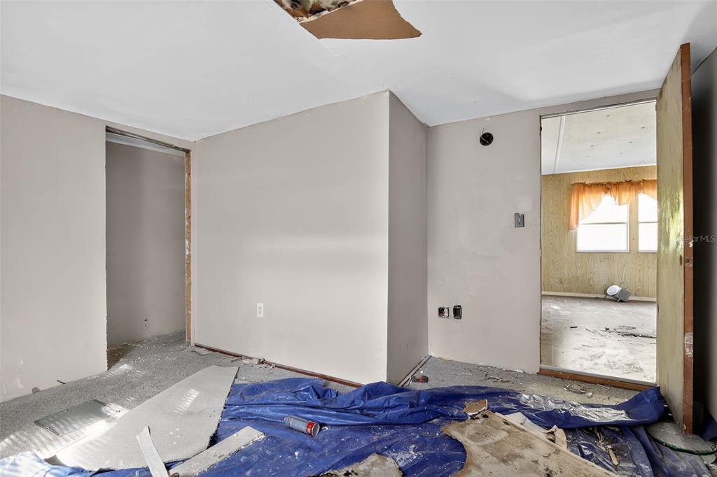 3140 Northeast 162 Place Citra, FL 32113 - Photo 21 of 30 a living room with hardwood floor and a window