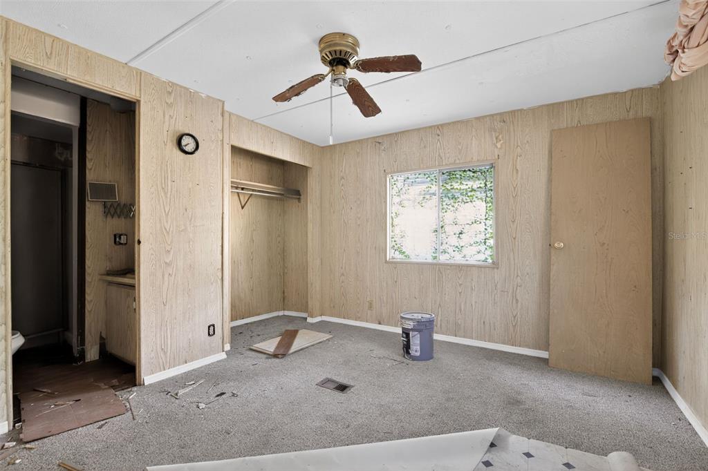 3140 Northeast 162 Place Citra, FL 32113 - Photo 23 of 30 a bathroom with a granite countertop sink and a mirror