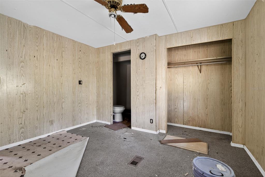 3140 Northeast 162 Place Citra, FL 32113 - Photo 24 of 30 a bathroom with a sink and a mirror