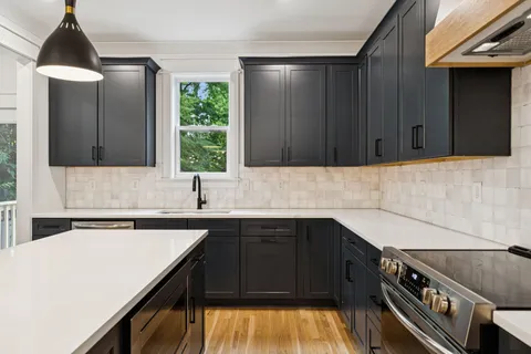 a kitchen with a sink and a cabinets