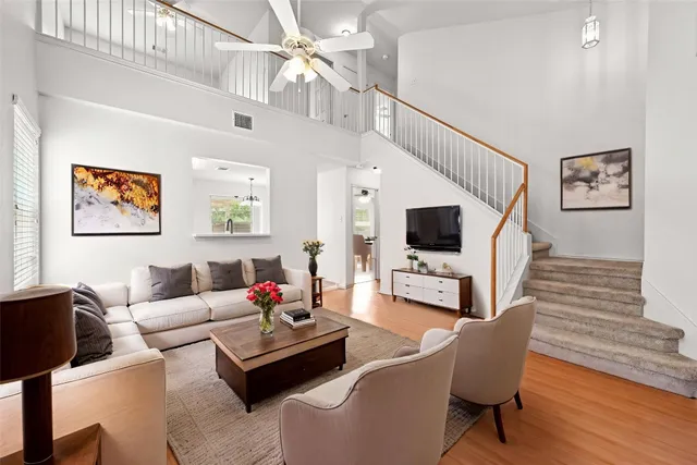 a living room with furniture or couch and a flat screen tv