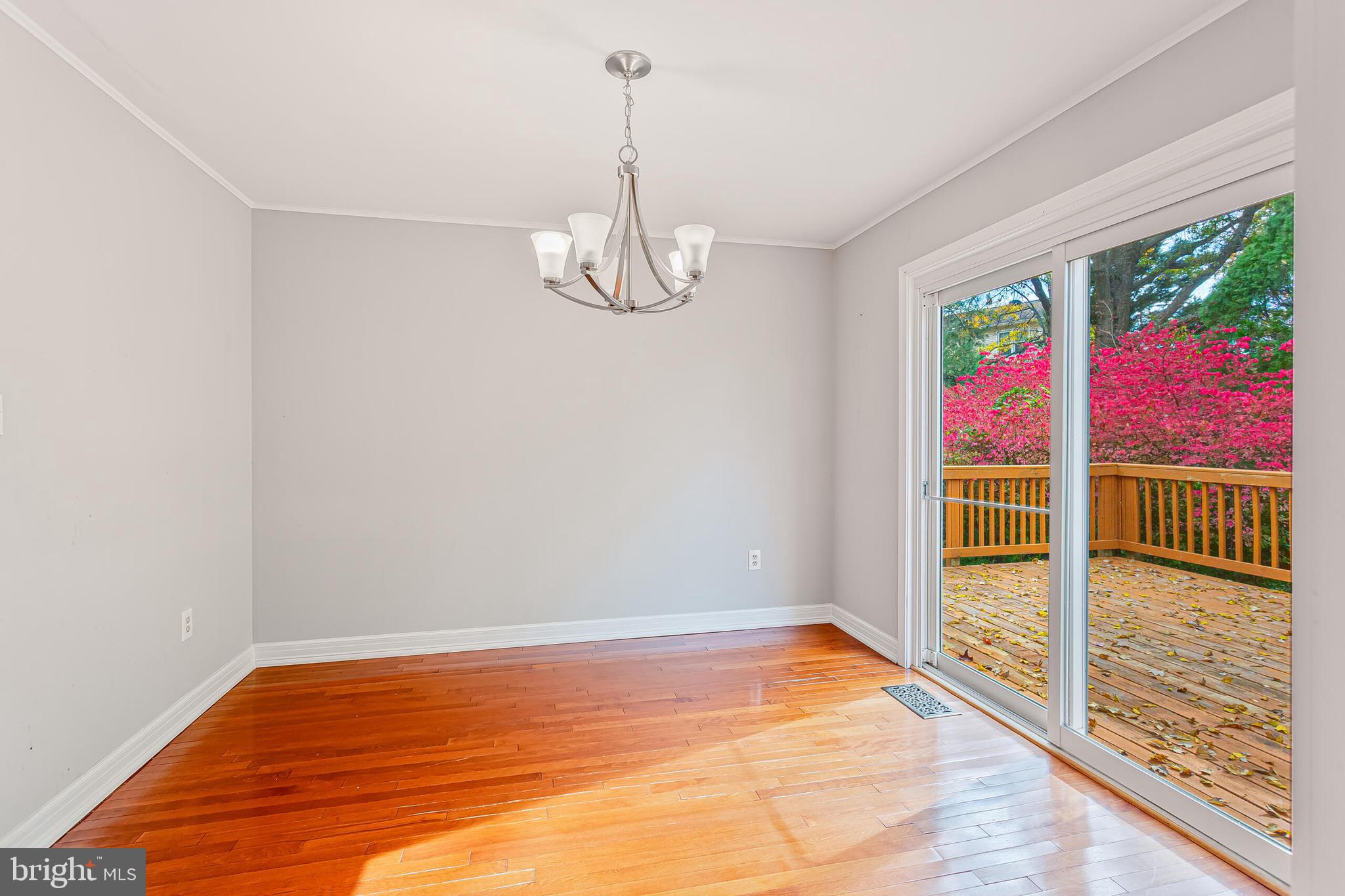 12027 Cheviot Drive Herndon, VA 20170 - Photo 11 of 29 a view of empty room with wooden floor and fan