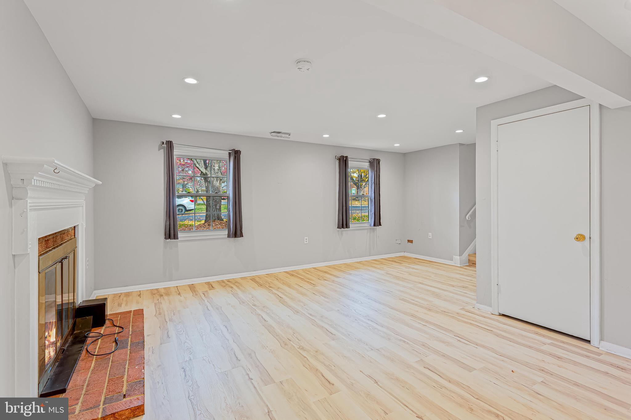 12027 Cheviot Drive Herndon, VA 20170 - Photo 23 of 29 a view of empty room with wooden floor and fan