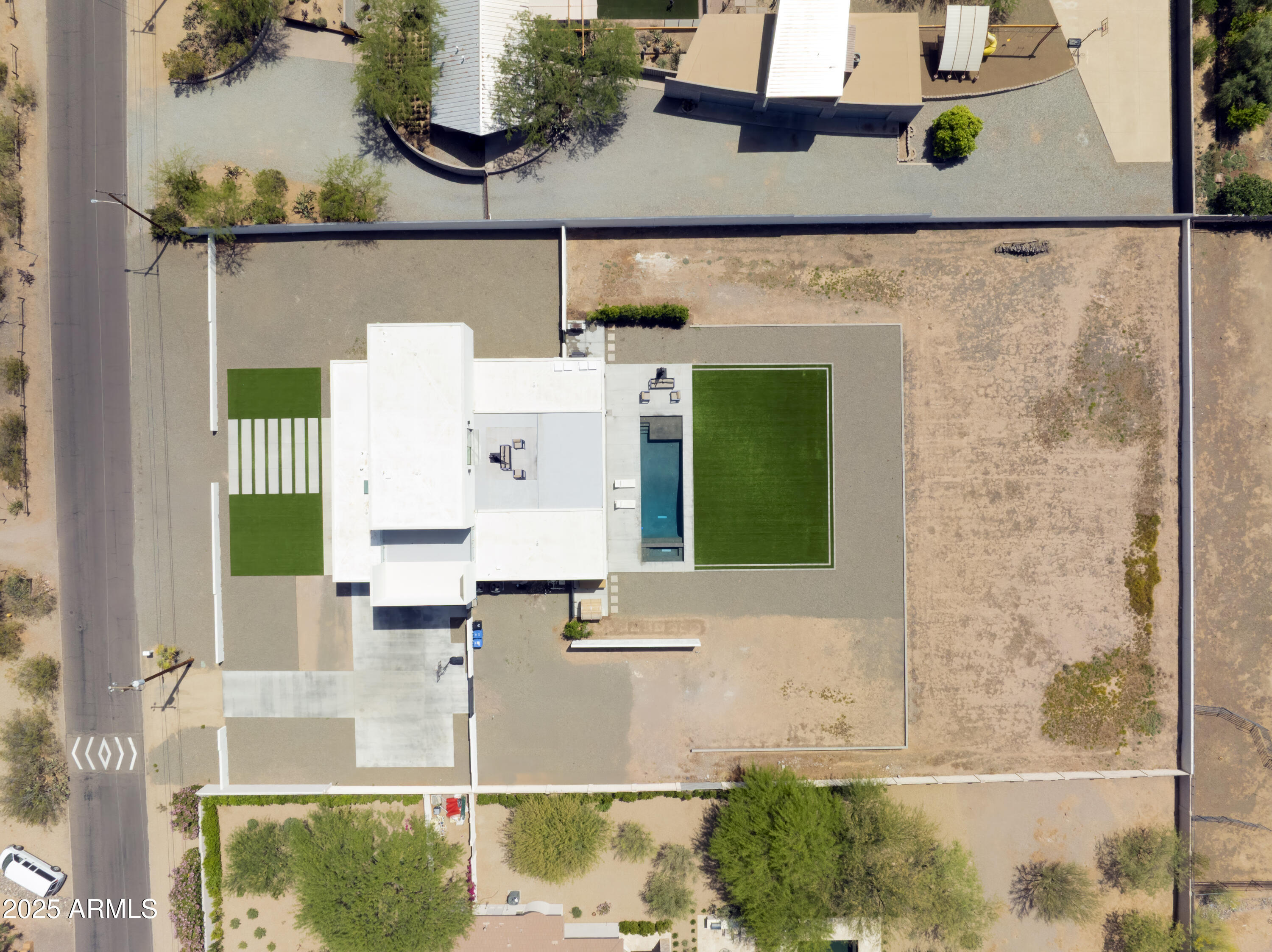 10310 North 37th Street Phoenix, AZ 85028 - Photo 47 of 51 an aerial view of a house with a swimming pool