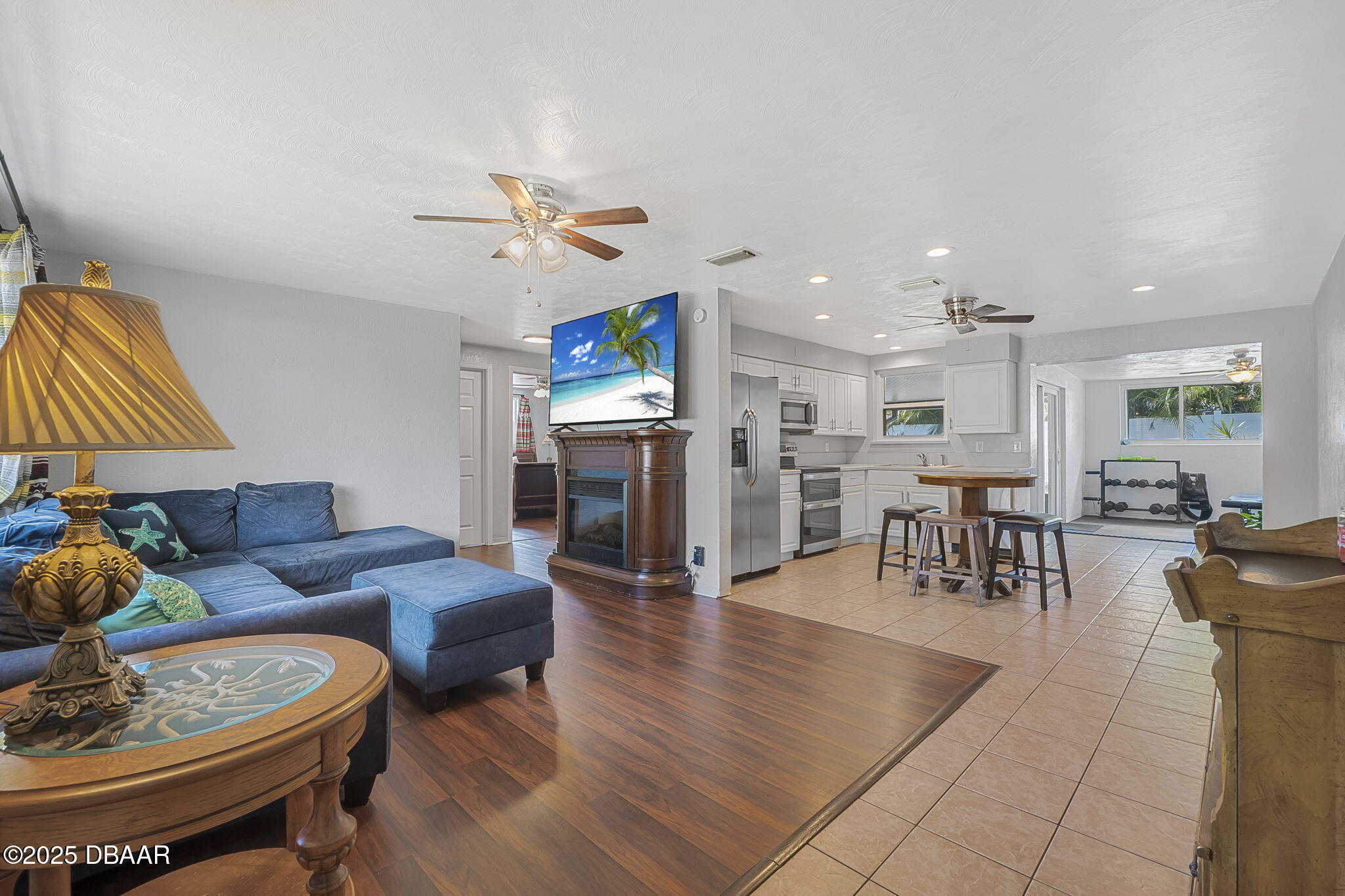 737 5th Street Port Orange, FL 32129 - Photo 11 of 40 a living room with furniture and kitchen view