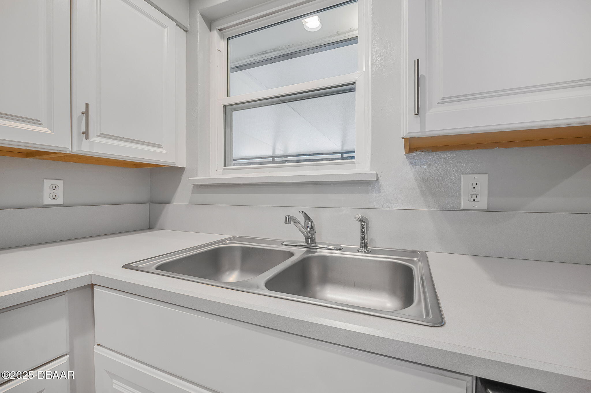 737 5th Street Port Orange, FL 32129 - Photo 15 of 40 a close view of sink and tap