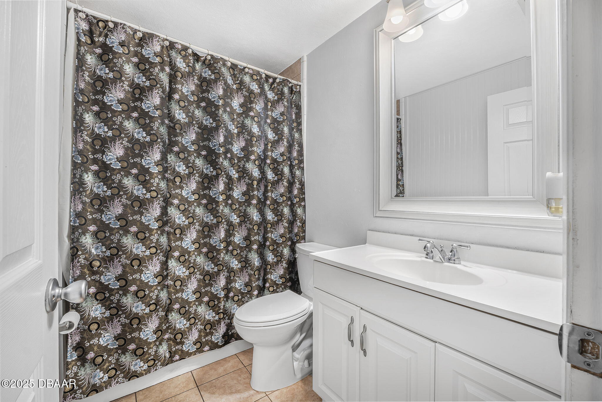 737 5th Street Port Orange, FL 32129 - Photo 20 of 40 a bathroom with a sink toilet and shower