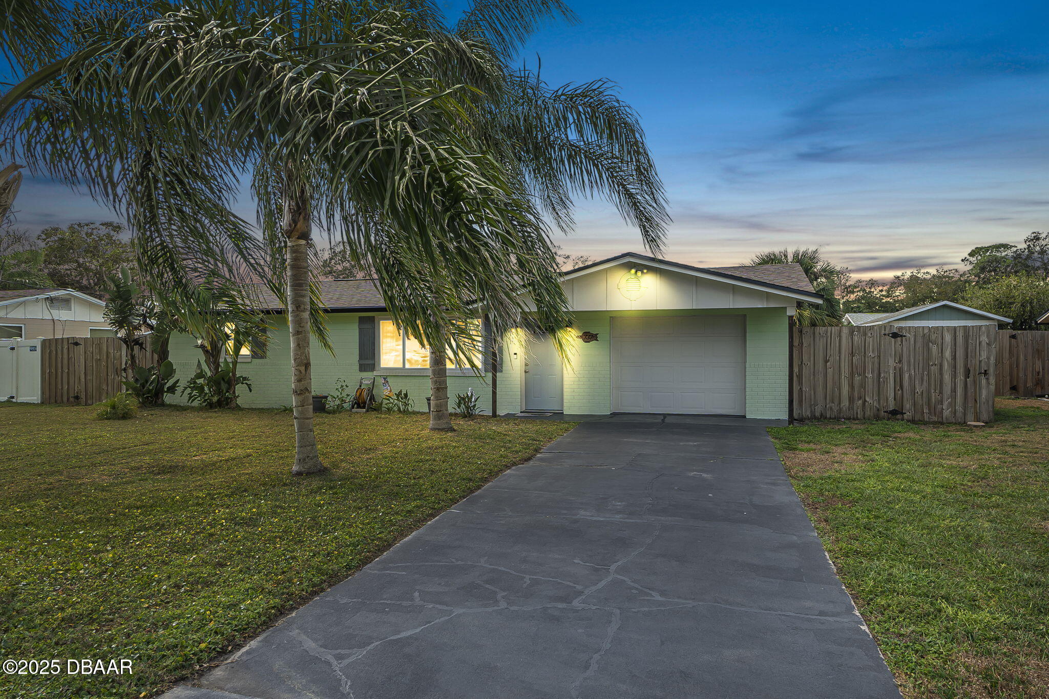 737 5th Street Port Orange, FL 32129 - Photo 2 of 40 a view of a house with a yard