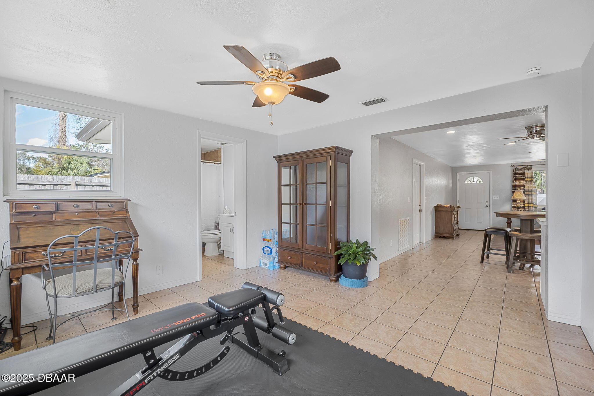 737 5th Street Port Orange, FL 32129 - Photo 26 of 40 a living room with furniture and a chandelier