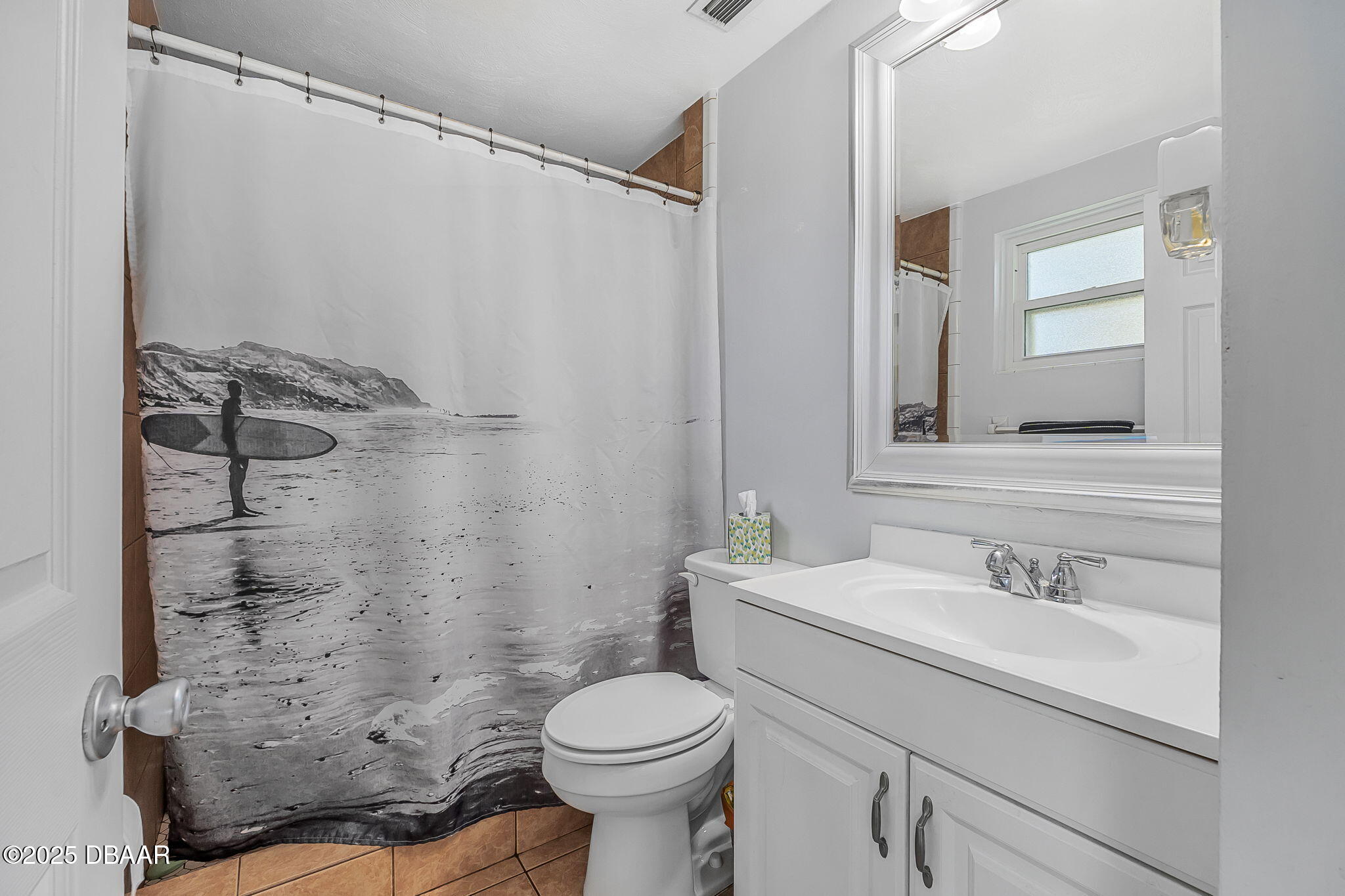 737 5th Street Port Orange, FL 32129 - Photo 27 of 40 a bathroom with a sink toilet and shower