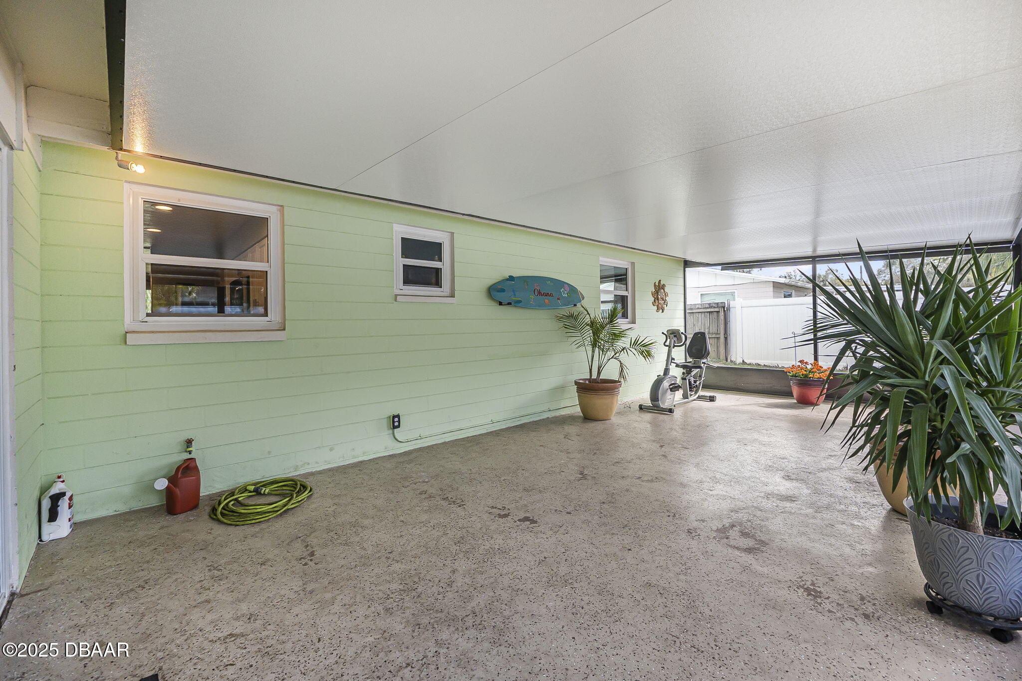 737 5th Street Port Orange, FL 32129 - Photo 29 of 40 a view of a livingroom with furniture and a potted plant