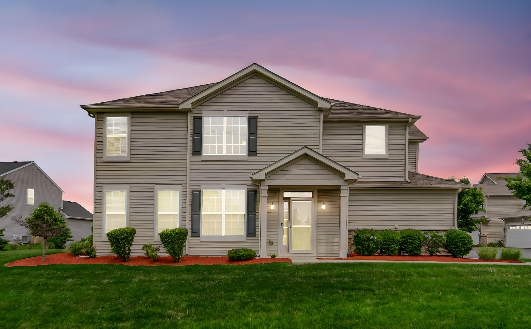 192 Owen Street Matteson, IL 60443 - Photo 1 of 2 a front view of a house with a yard and garage