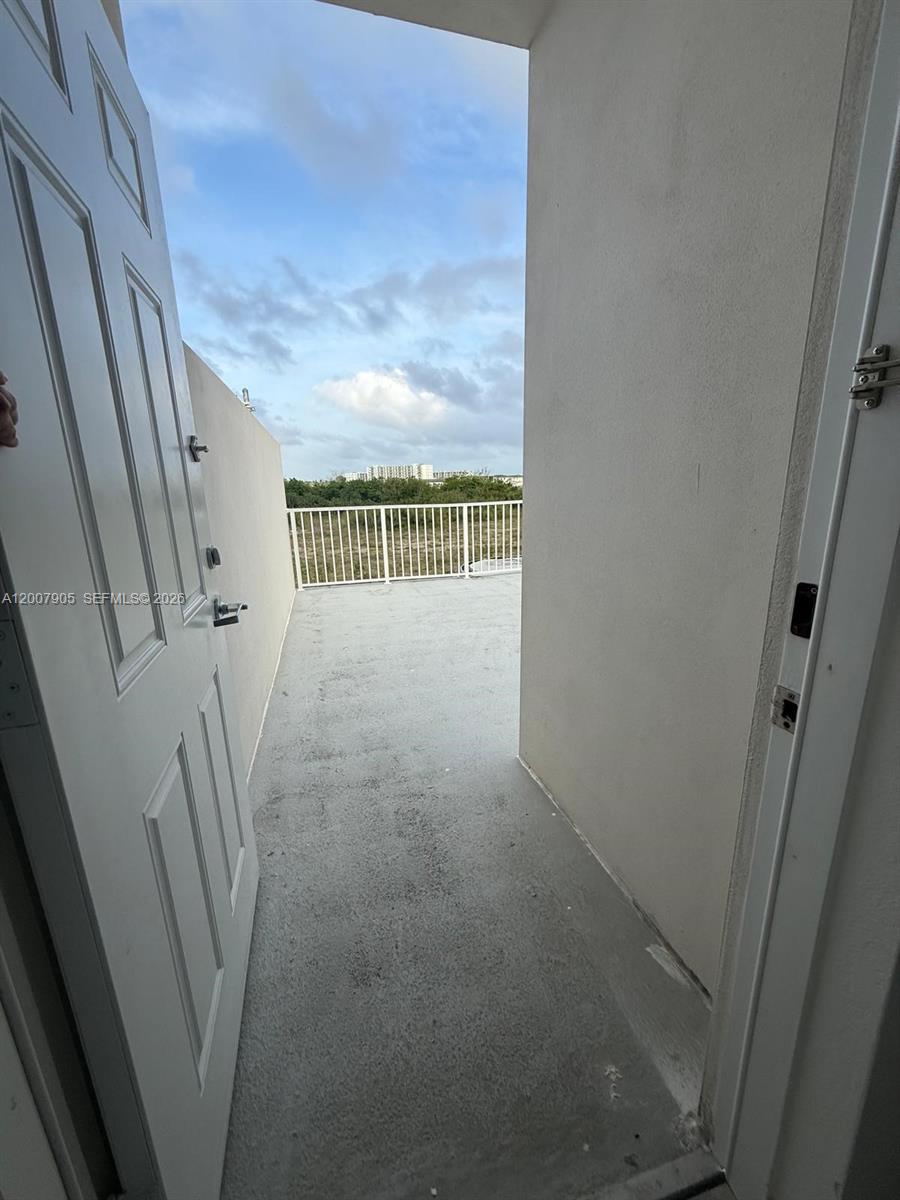 25664 Southwest 143rd Path, Unit 25664 Homestead, FL 33032 - Photo 16 of 17 a view of entryway