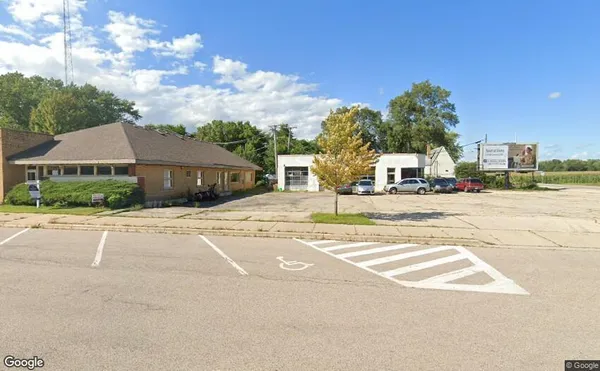 a house with trees in front of it