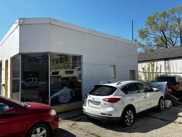 a car parked in front of a building