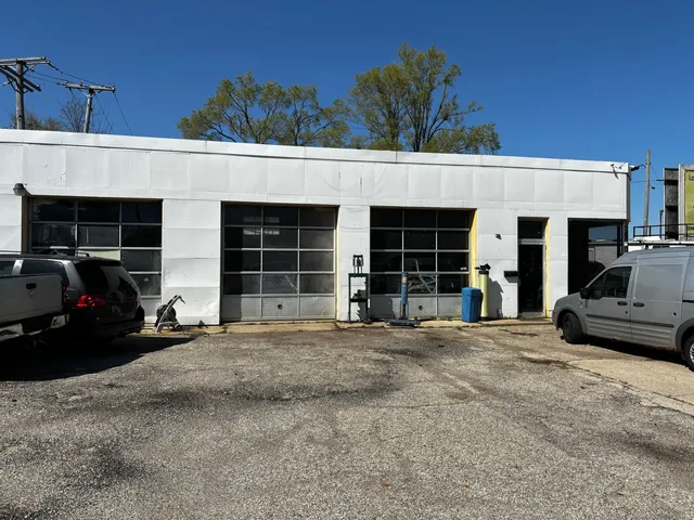 a view of a car park in front of house