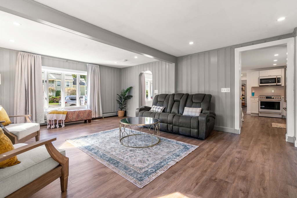 381 Main Street Saugus, MA 01906 - Photo 14 of 31 a living room with furniture and wooden floor