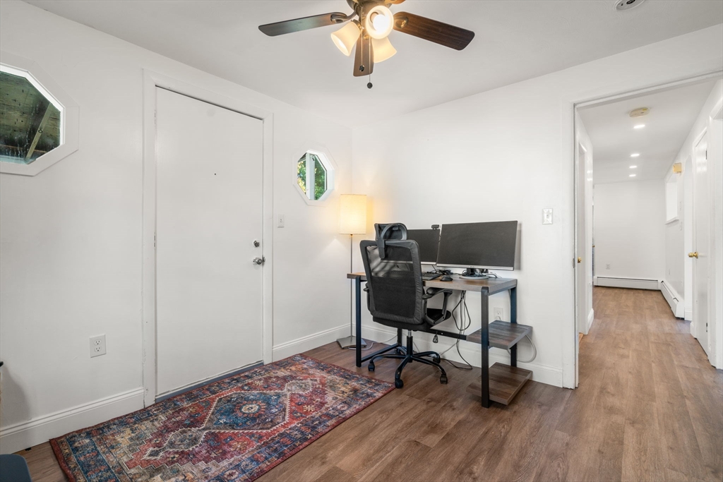 381 Main Street Saugus, MA 01906 - Photo 23 of 31 a workspace with furniture and wooden floor